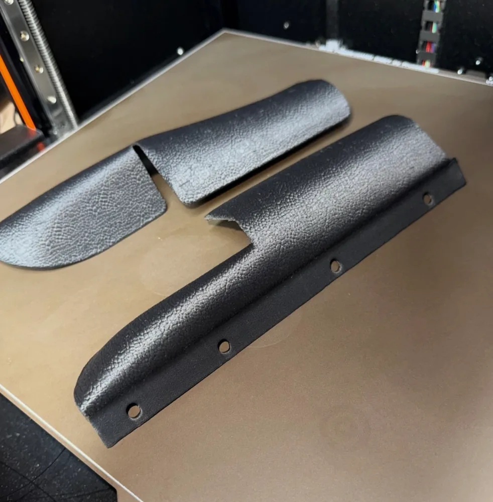 Textured black automotive interior trim panels